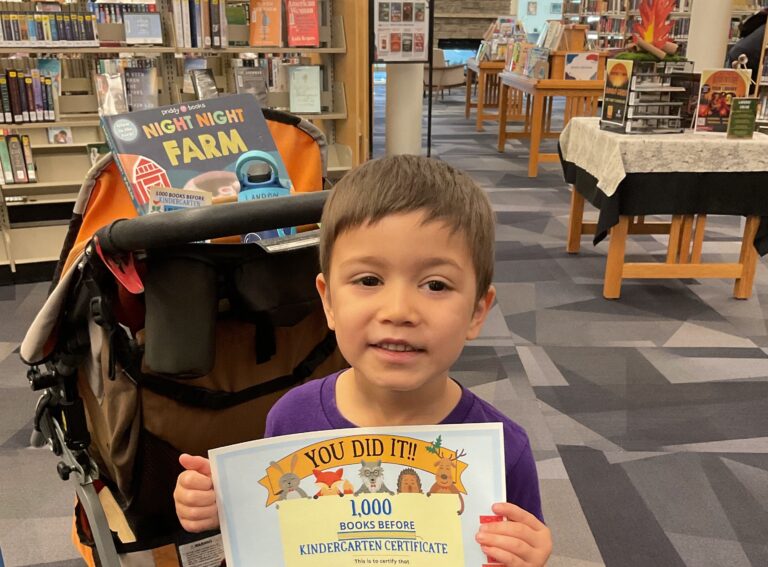 Smiling Graduate of 1,000 Books Before Kindergarten