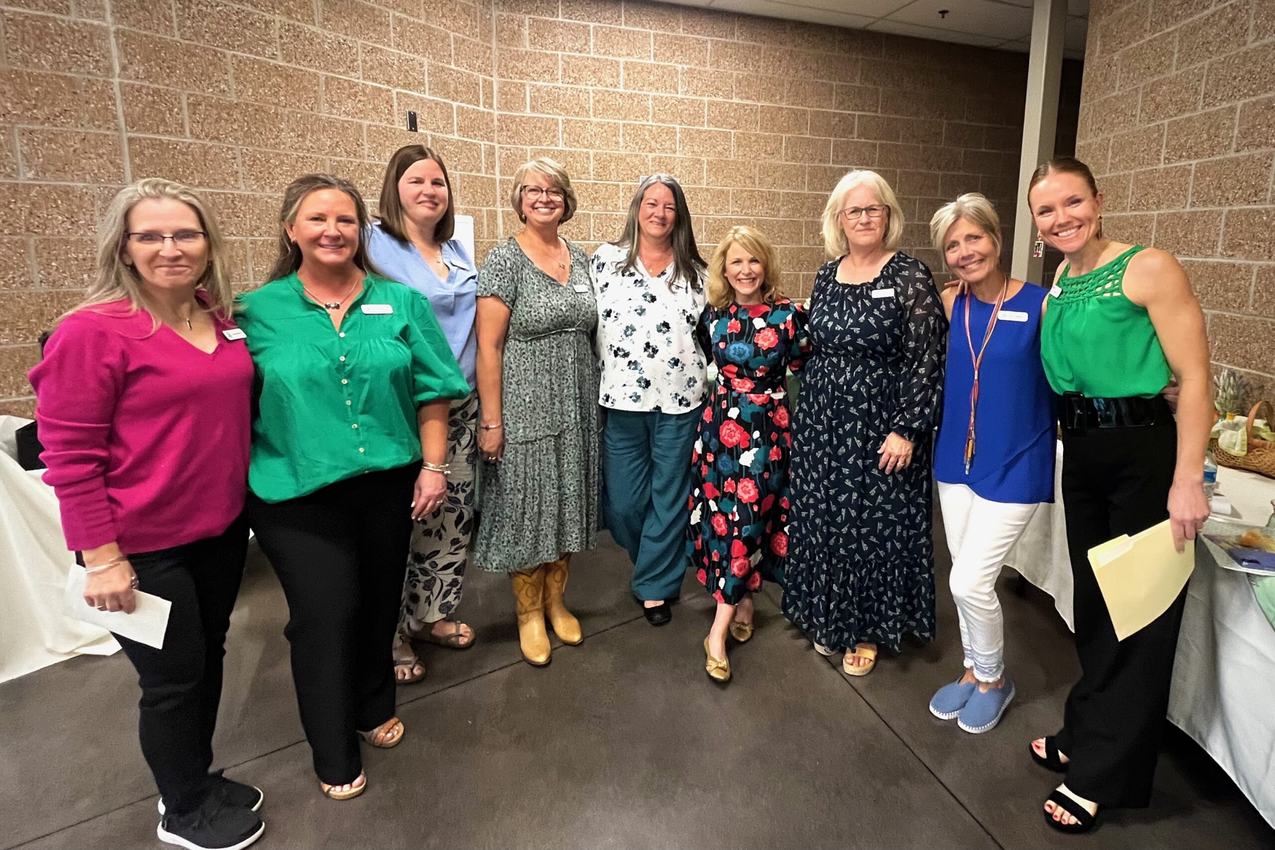 Board Members posing with author Kristin Harmel.